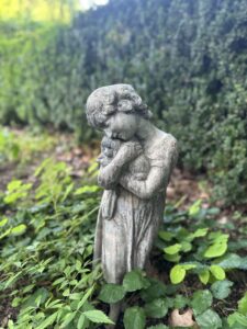 Girl and Lamb Statue